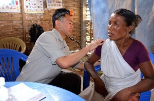 Dr. Yong Treating a Patient at the Medical Clinic