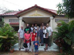 Records, Pastor Nicolas and Luz (Guatemala), and CCLM team in front of our old house in Kampong Chhnang.  Pastor Nicolas and his family are renting it now.  Darryl and Pastor Nicolas' family have been friends since 2001.  When they arrived in Cambodia, they couldn't speak Khmer or English so Darryl's fluency in Spanish paid off. 