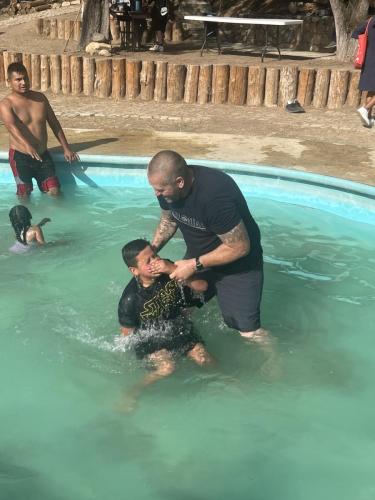 Jon had the honor of baptizing our great friends' son during the 5th anniversary celebration.